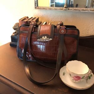 Marc Chantal embossed leather bag.